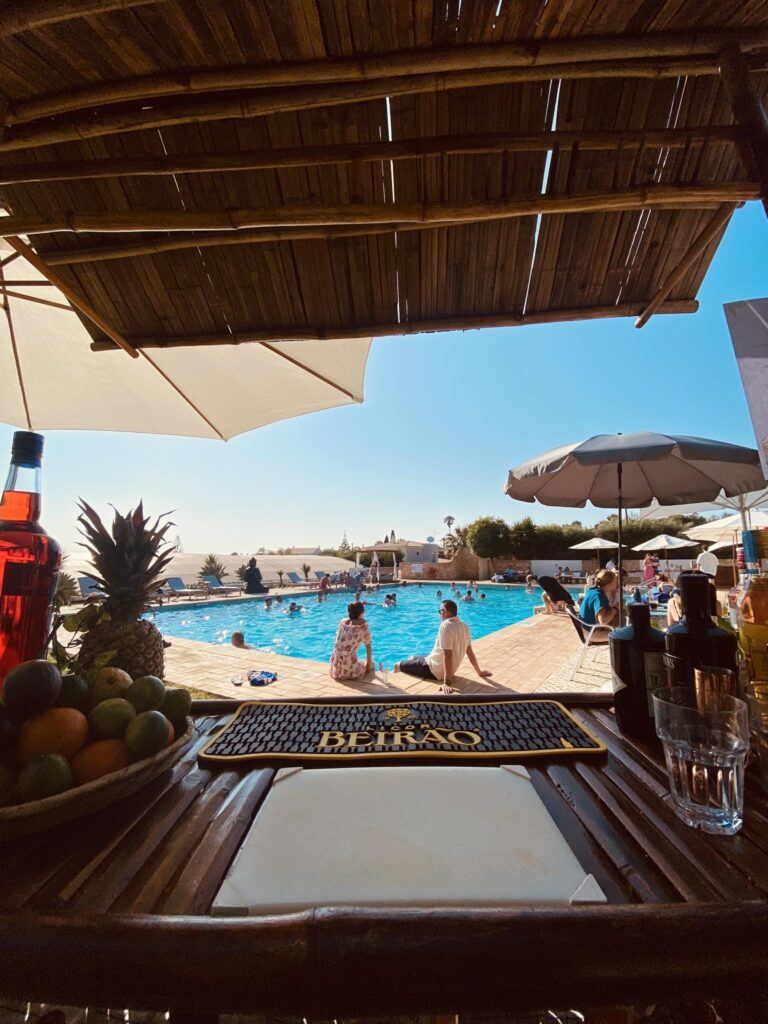 A view of the pool during a busy summer day of Kinoah restaurant in Luz